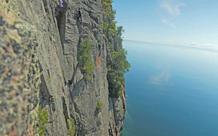 adults learn rock climbing skills